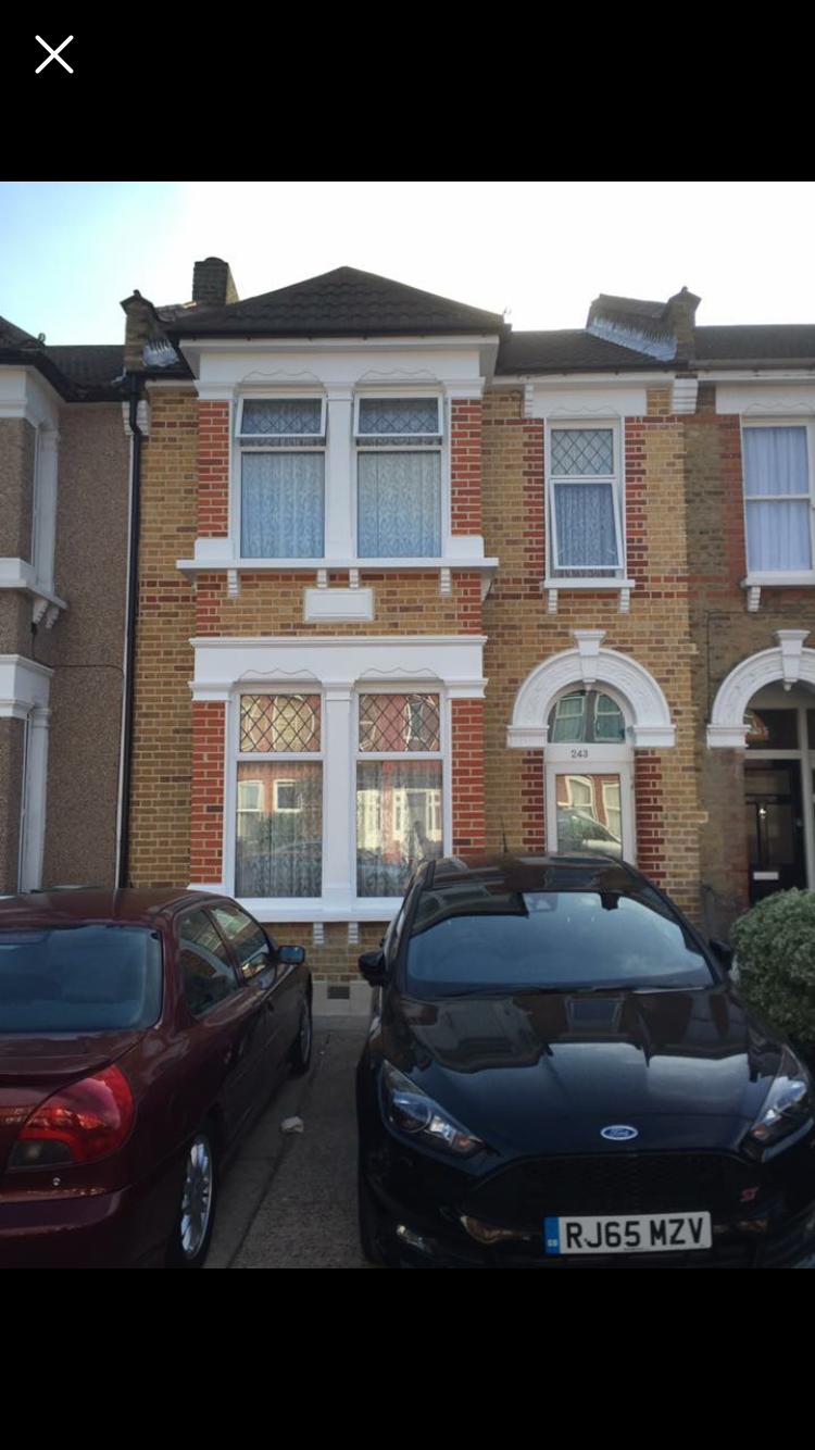 Brick terraced house front elevation repointed to keep rain out of the walls