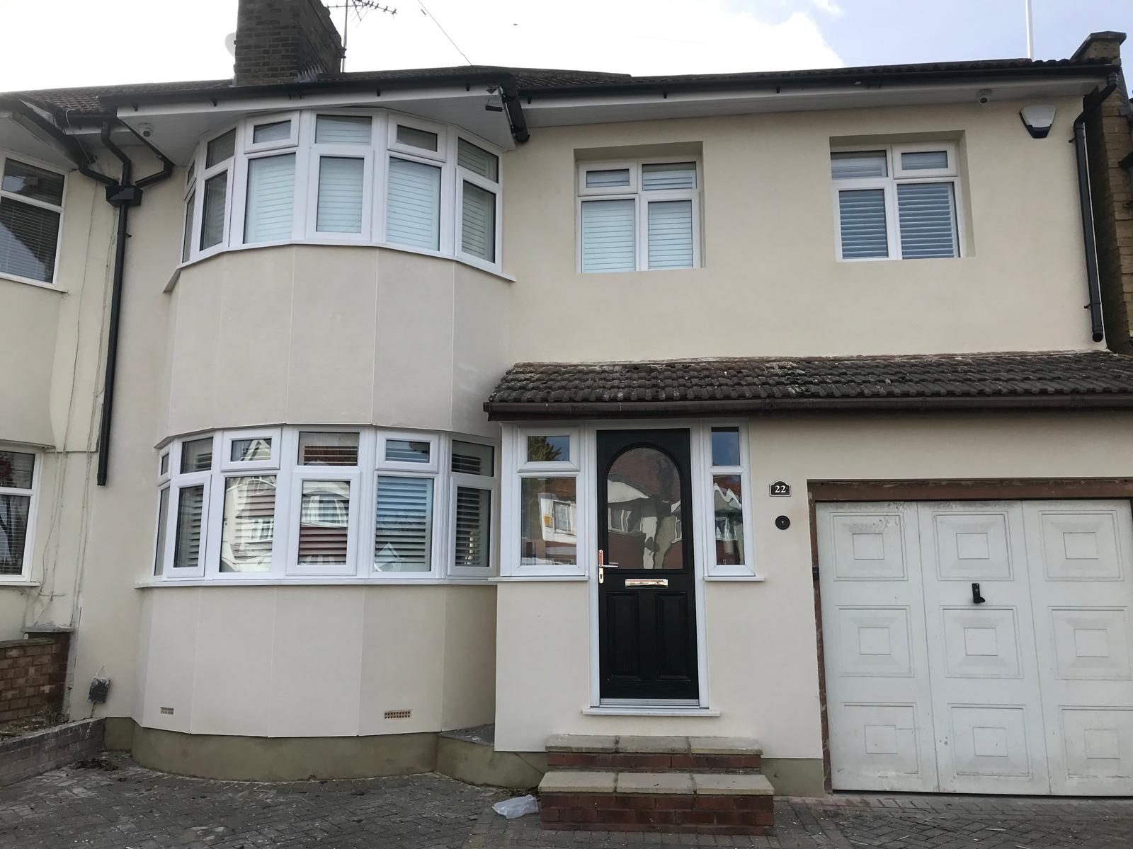 Sand and cement rendering to a house exterior in London and Kent: project 08