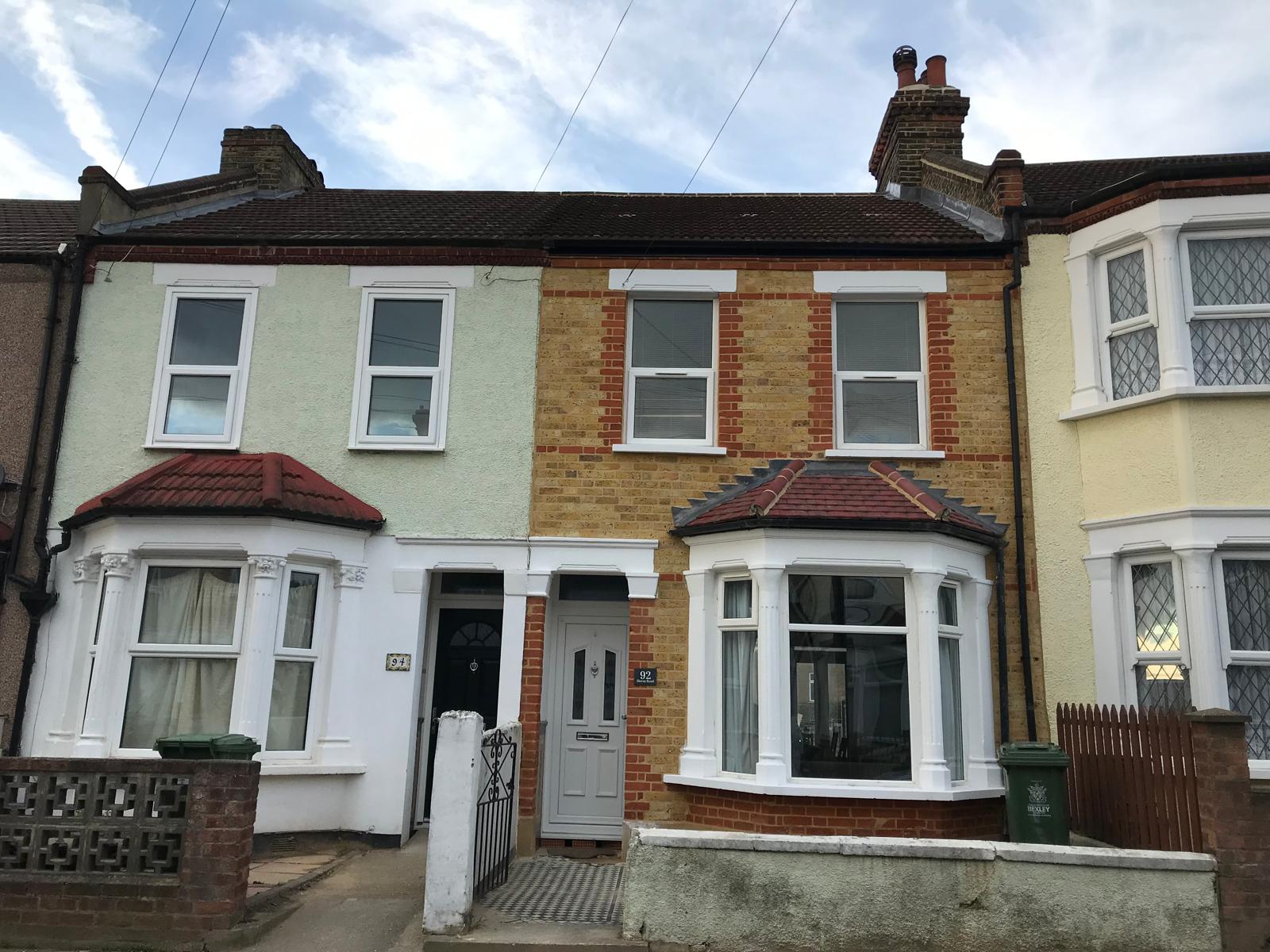 Same terraced house with yellow stock brickwork and red brick detail fully repointed